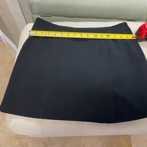 Bebe Lined 8 black skirt with kick pleat -16 in in waist